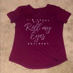 A shirt that has a cute saying on it.